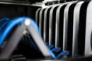 a close up of a bunch of wires in a rack